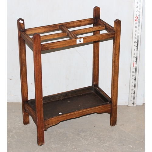 23 - Vintage oak 4 section stick stand with metal drip tray