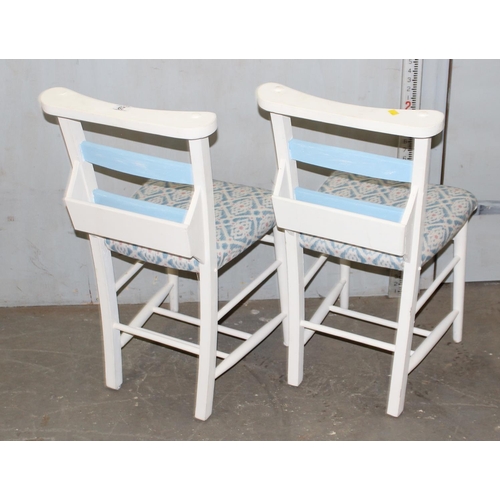 29 - A pair of vintage painted and upholstered chapel chairs