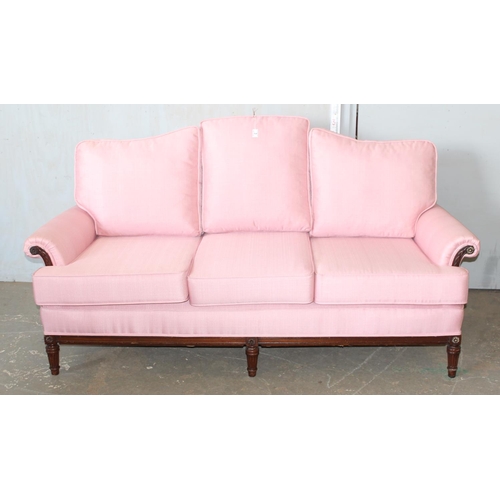 3 - A Regency style deep seated 3 seater sofa with light pink upholstery standing on reeded legs