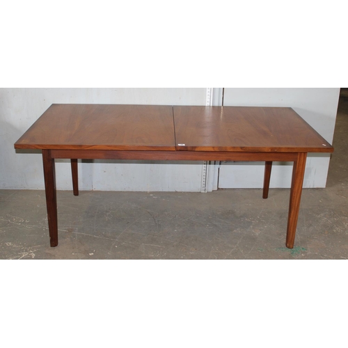 30 - A large retro extending teak dining table, possible Danish, approx 183cm x 92cm (extends to 228cm)