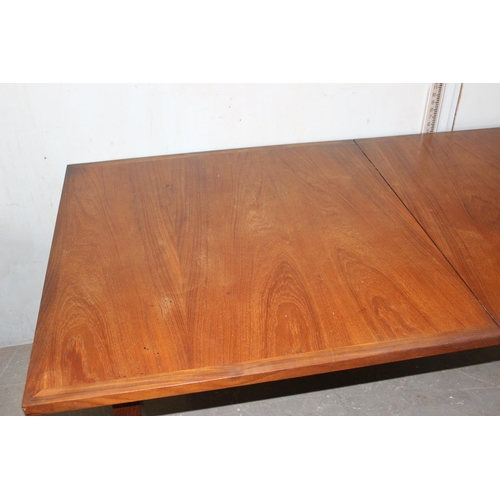 30 - A large retro extending teak dining table, possible Danish, approx 183cm x 92cm (extends to 228cm)