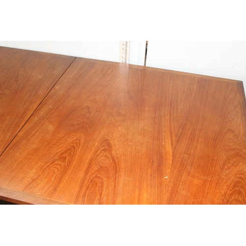 30 - A large retro extending teak dining table, possible Danish, approx 183cm x 92cm (extends to 228cm)