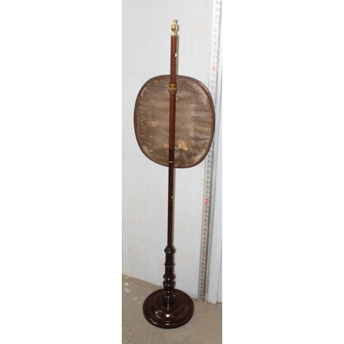 47 - An antique mahogany pole screen with tapestry panel