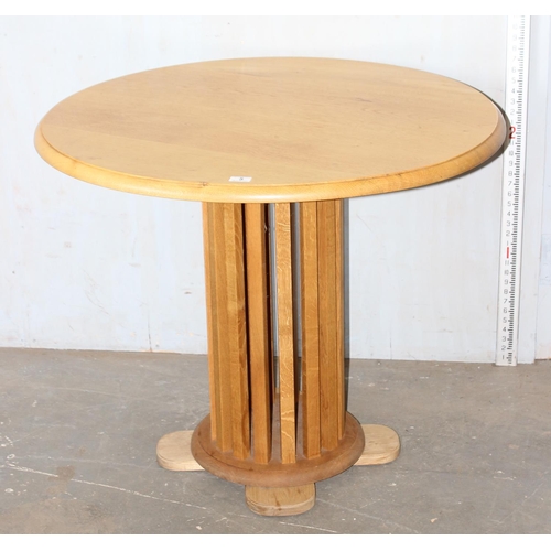 5 - An unusual light oak pedestal table with slatted wooden support