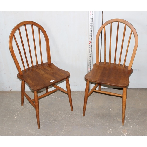 52 - A pair of Ercol hoop back dining chairs