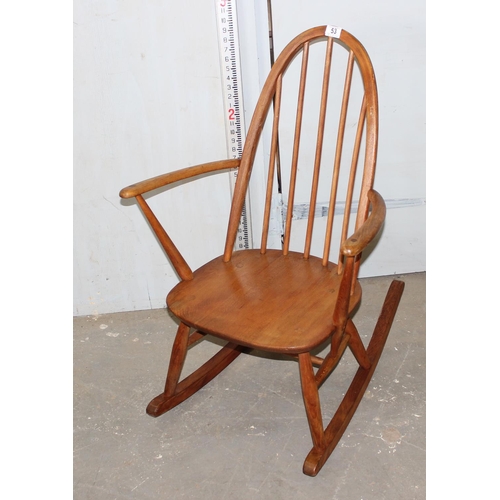 53 - A vintage hoop backed rocking chair, likely Ercol but unmarked