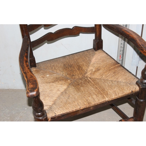 54 - Antique ladderback chair with rush seat