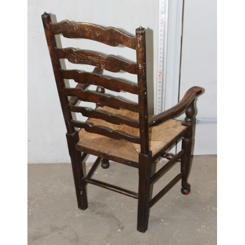 54 - Antique ladderback chair with rush seat