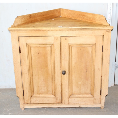 6 - A Victorian pine corner cupboard