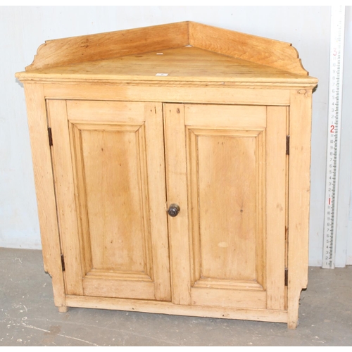 6 - A Victorian pine corner cupboard