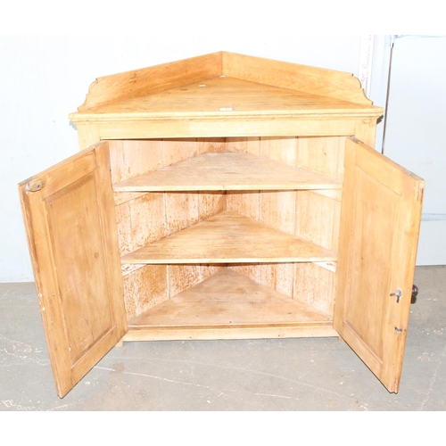 6 - A Victorian pine corner cupboard