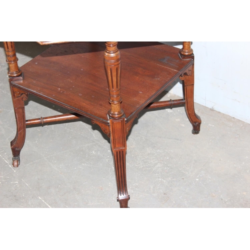 64 - An Edwardian octagonal side table with turned supports