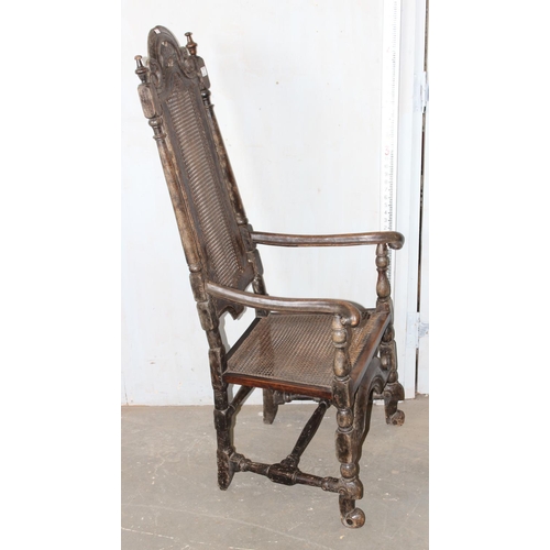 7 - A mid - late 17th century Carolean carved walnut chair, with caned seat and back