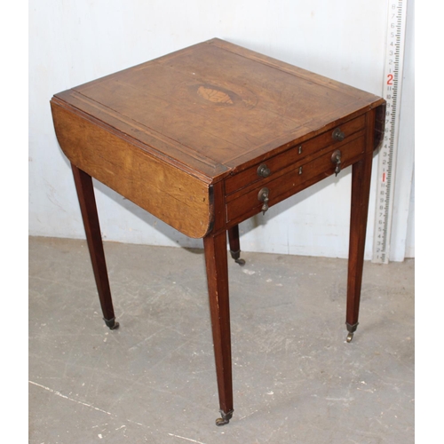 79 - An antique Sheraton style cross banded games table with slide-out square top, with chequerboard reve... 