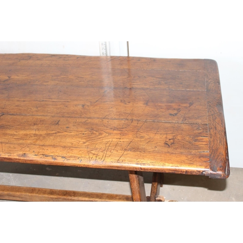 8 - An antique elm or oak 4 plank refectory table, approx 2m long