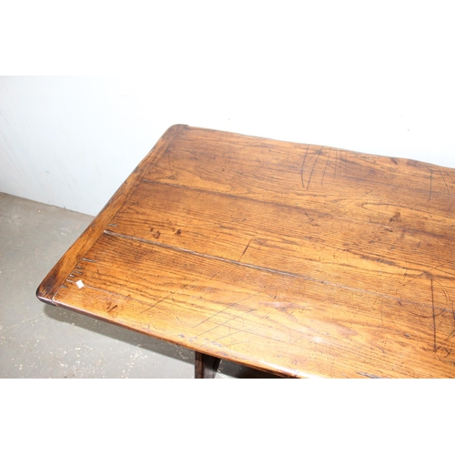 8 - An antique elm or oak 4 plank refectory table, approx 2m long