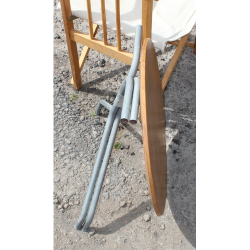 109 - 2 folding chairs together with a folding tripod table (3)