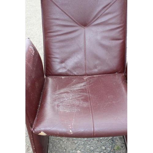 114 - 2 unusual leather retro style chairs