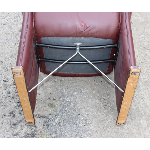 114 - 2 unusual leather retro style chairs