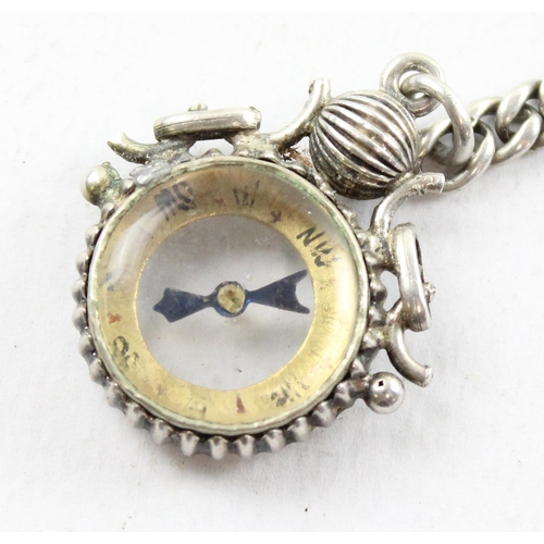 1402 - An antique silver Albert watch chain with a white metal fob, approx 41cm long & 33.3g gross