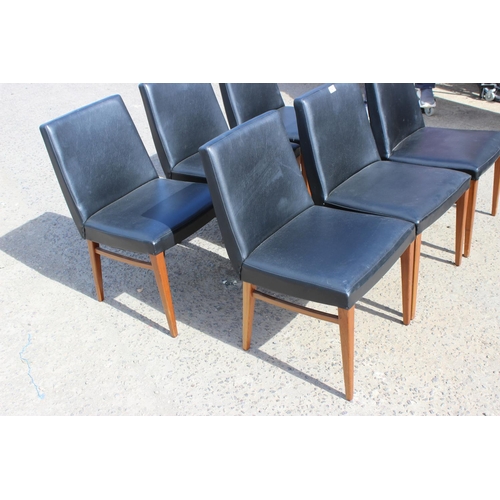 147A - A set of 6 retro black leatherette dining chairs believed to be G-Plan by Ib Kofod Larsen, unmarked