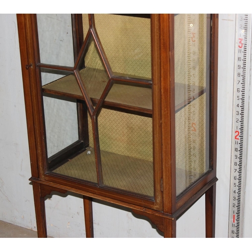 14 - An Edwardian Sheraton revival glazed display cabinet