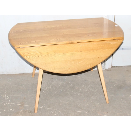 2 - Blonde Ercol drop leaf dining table with blue & gold label