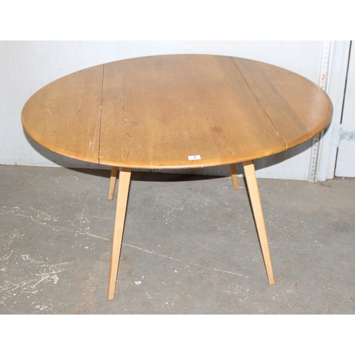 2 - Blonde Ercol drop leaf dining table with blue & gold label