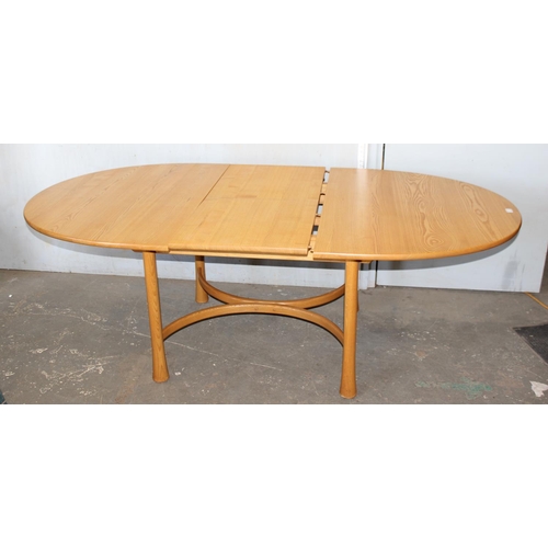 3 - A vintage blonde Ercol extending dining table