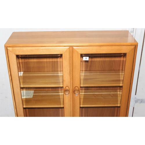 9 - Blonde Ercol bookcase with 2 glazed doors