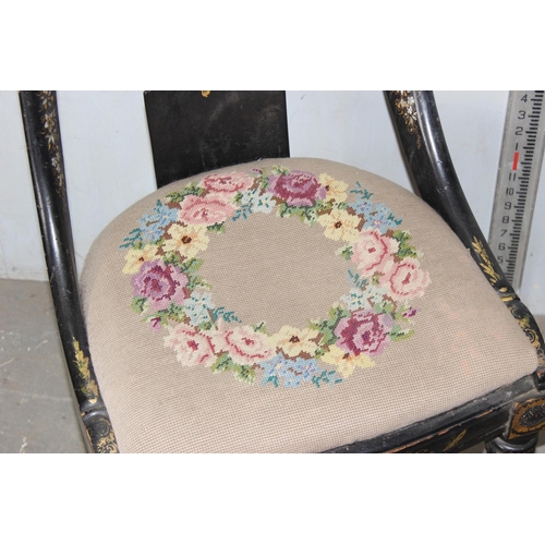 60 - A Victorian black japanned papier mache spoon back chair with pierced back splat, drop in upholstere... 
