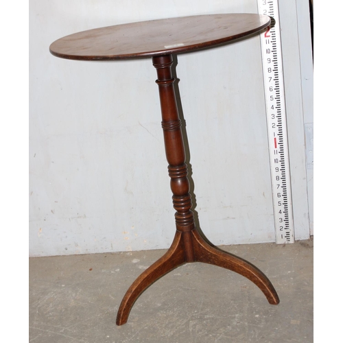 21 - A 19th century round mahogany side table on turned support and tripod base