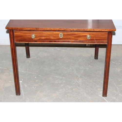 23 - 19th century mahogany foldover tea table with brass handle and drawer