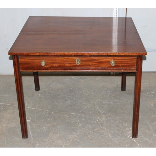 23 - 19th century mahogany foldover tea table with brass handle and drawer