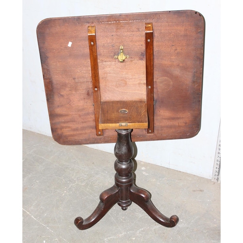 40 - A small antique square topped tilt top table