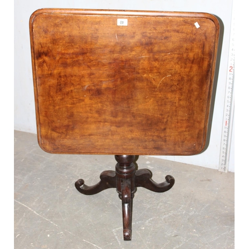 40 - A small antique square topped tilt top table