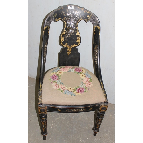 60 - A Victorian black japanned papier mache spoon back chair with pierced back splat, drop in upholstere... 