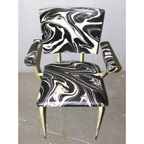 68 - A pair of mid-century retro armchairs with black and white marbled upholstery