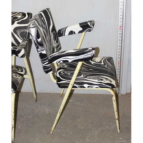 68 - A pair of mid-century retro armchairs with black and white marbled upholstery