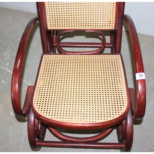 69 - A vintage Thonet style bentwood rocking chair with Bergere seat and back