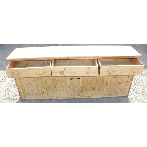 133 - Antique stripped pine dresser base with 3 drawers over 2 cupboards