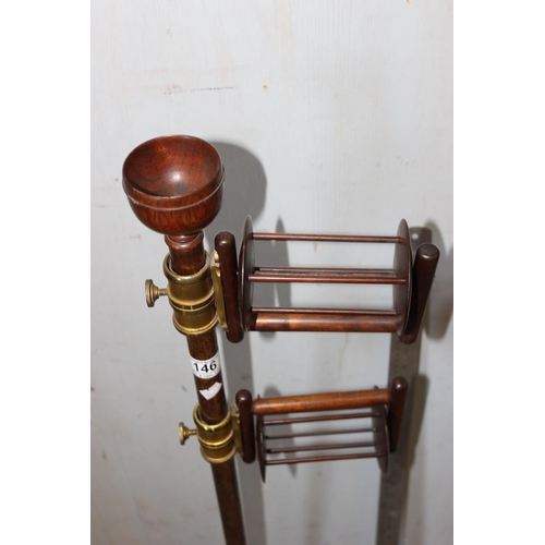 146 - A Victorian mahogany wool winder on turned base, with brass fittings