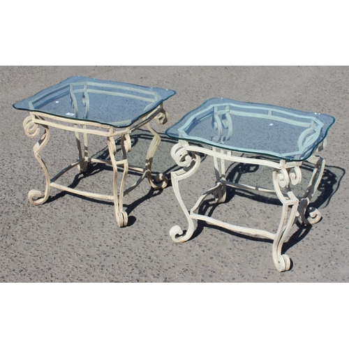 159 - A pair of glass topped wrought iron tables