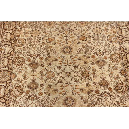 209 - Decorative cream ground rug, approx 205cm x 135cm