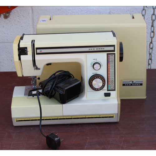 889 - Cased New home sewing machine