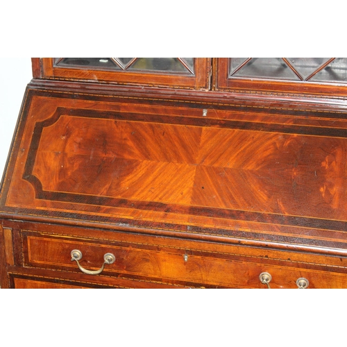 183 - An antique bureau bookcase with glazed top and brass drop handles