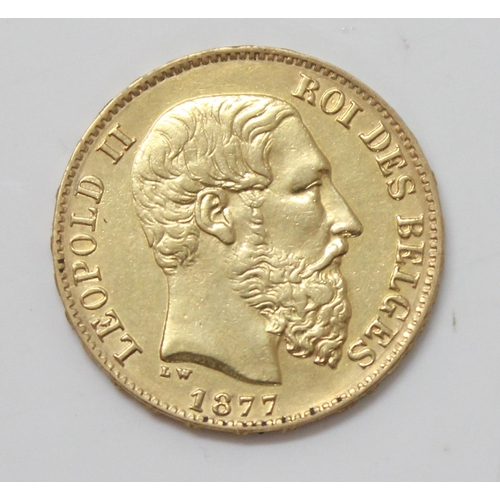 1337 - Coins, Belgium, a 20 Franc gold coin dated 1877, approx 6.6g gross weight, approx 21mm diameter, .90... 