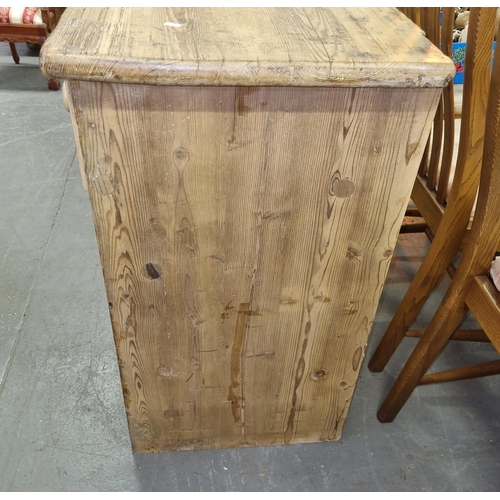 133 - Antique stripped pine dresser base with 3 drawers over 2 cupboards