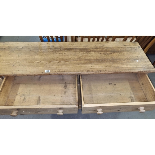 133 - Antique stripped pine dresser base with 3 drawers over 2 cupboards