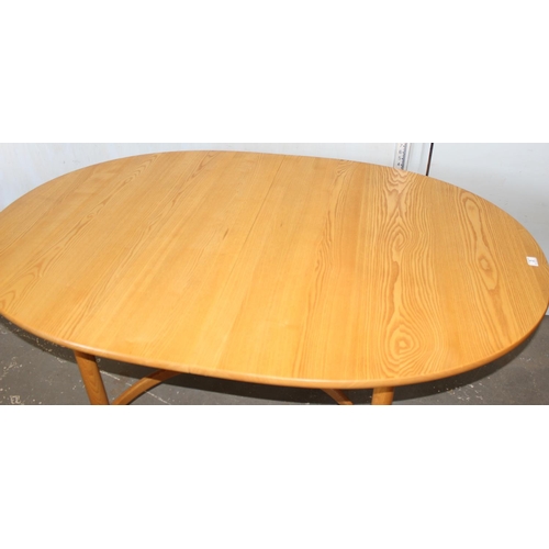21A - A vintage blonde Ercol extending dining table
